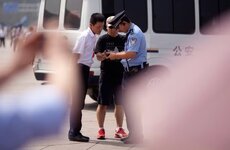 2012 Tiananmen checking photos.jpg 2012 Tiananmen checking photos.jpg